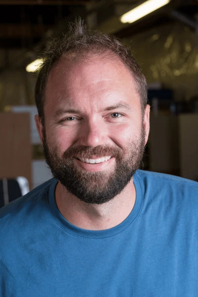 files/bearded-man-headshot-portrait-600nw-1009304347.webp